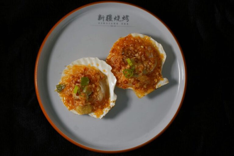Garlic scallops on the half shell