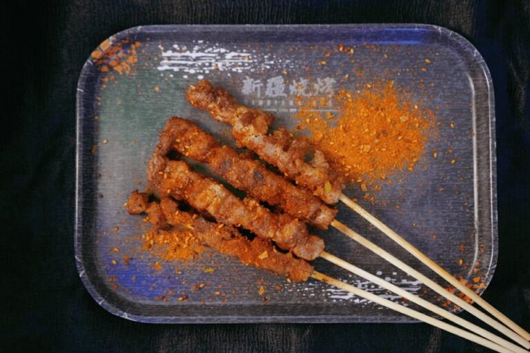 Lamb skewers dusted with cumin and chili